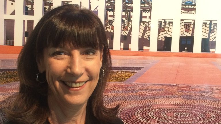 karenne in front of parliament house, canberra