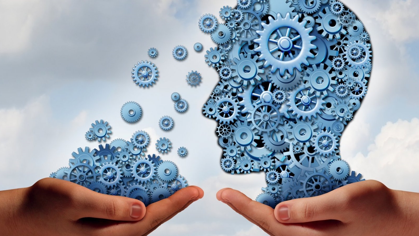 two hands with graphic cogs forming human head