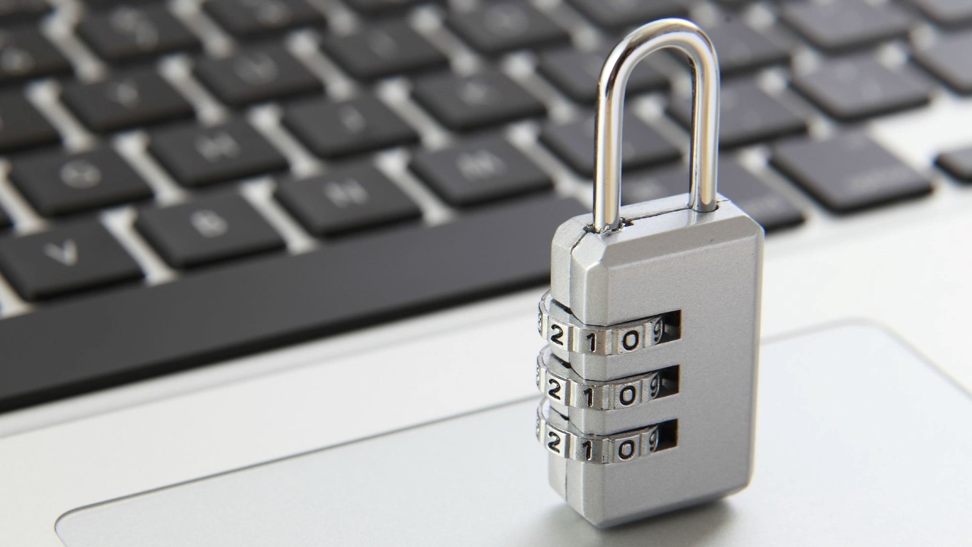 a padlock on laptop keyboard