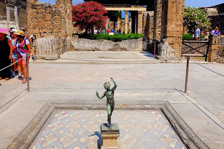 the pompeii faun statue in middle of house
